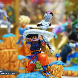 JacksDo - Goku bites Frieza StatueCorp