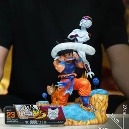 JacksDo - Goku bites Frieza StatueCorp