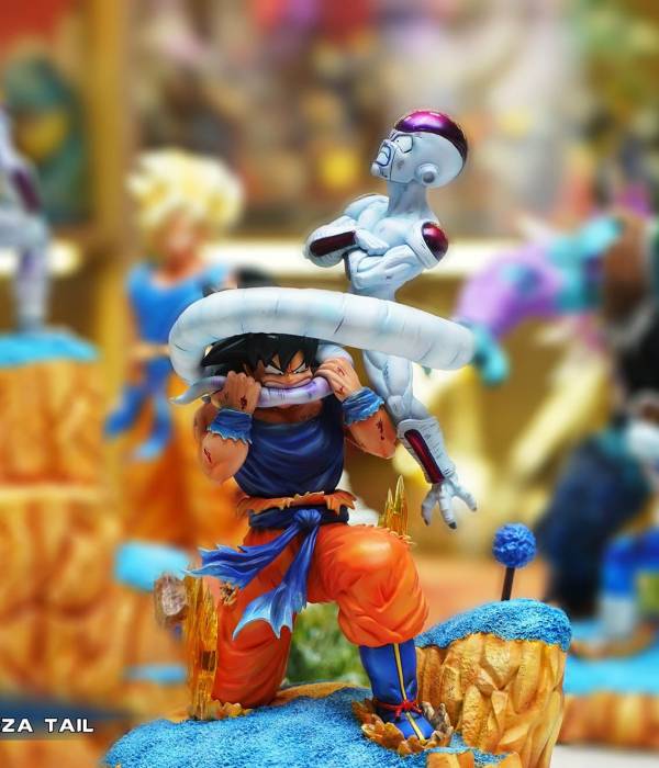 JacksDo - Goku bites Frieza StatueCorp